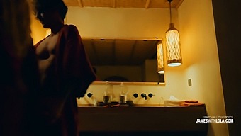 A Romantic Couple’s Intimate Moment In Their Hotel Room.